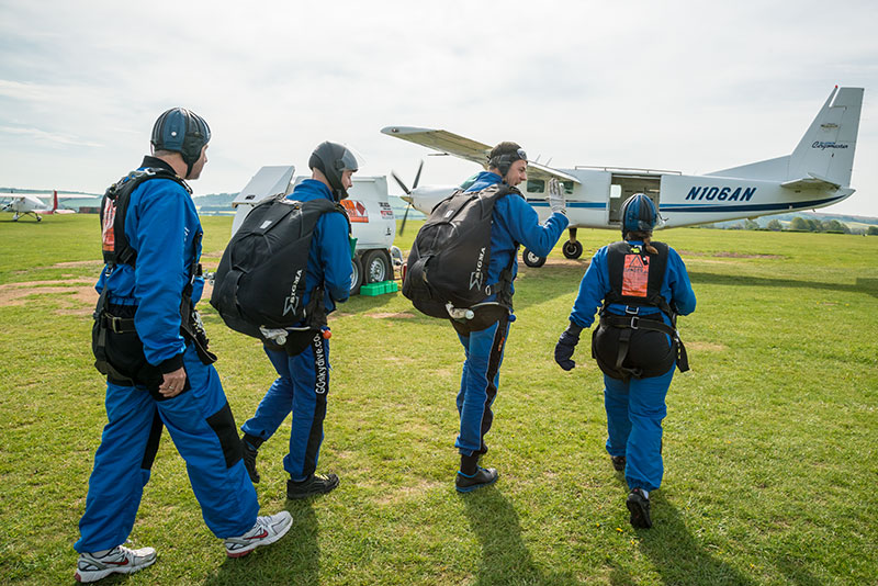 Skydivers preparing to board plane